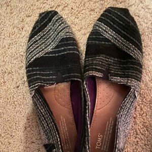 Toms. Lightly worn.